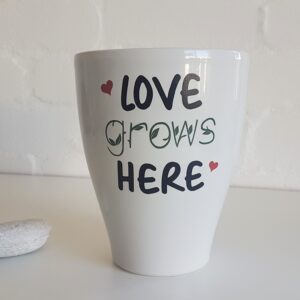 Ceramic pot plant holder